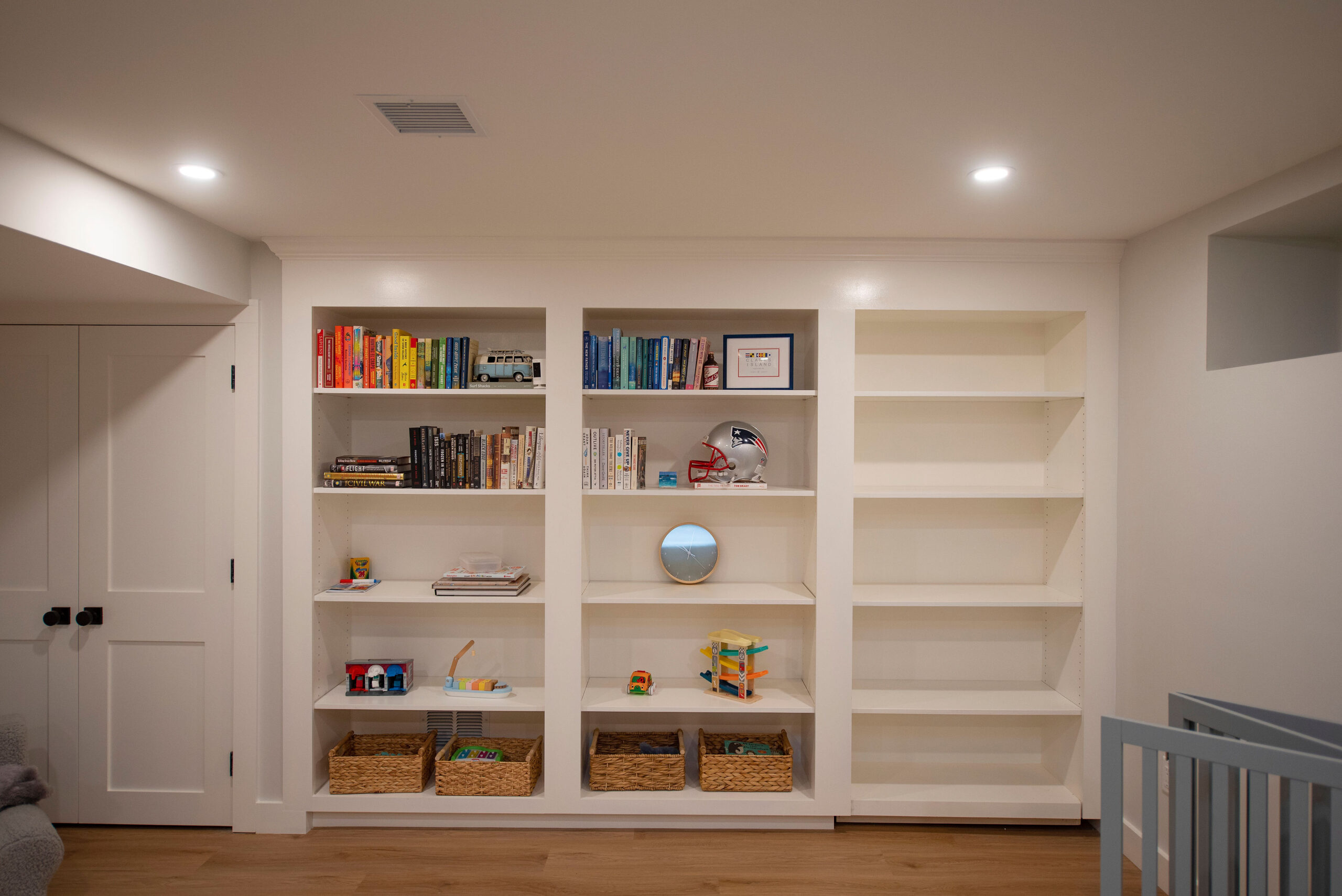 Built-in book shelves in remodeled basement